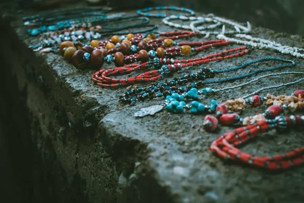 A display of handcrafted beaded necklaces showcasing traditional moroccan jewelry and Berber style